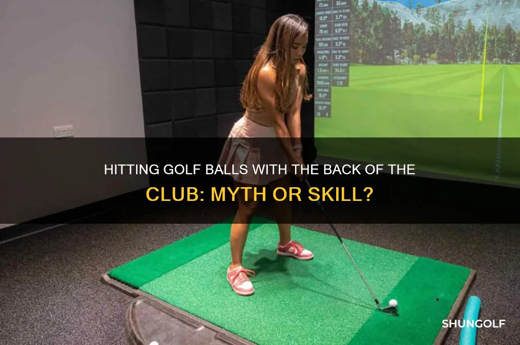 can you hit golf ball with back of club