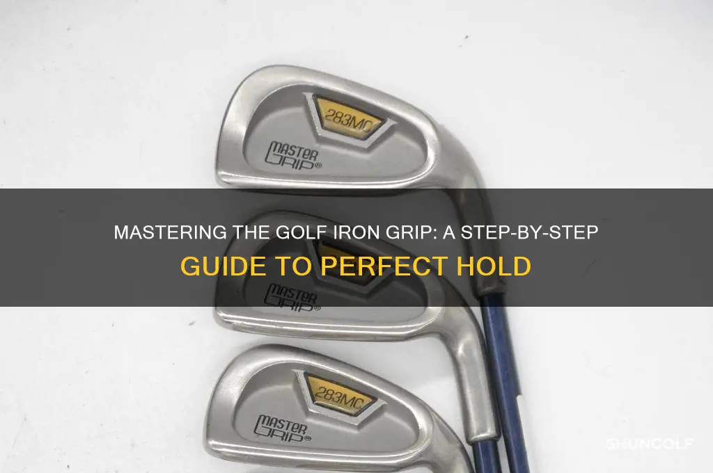 how do you hold a golf iron