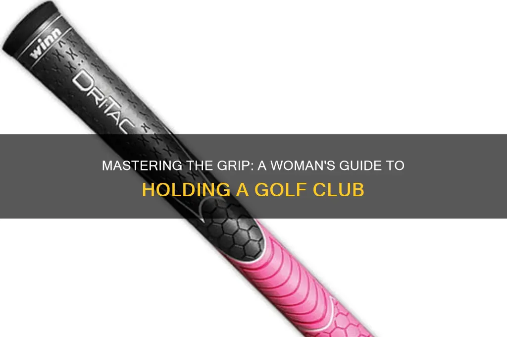 how should a woman hold a golf club
