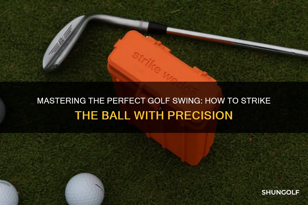 how should golf club strike ball
