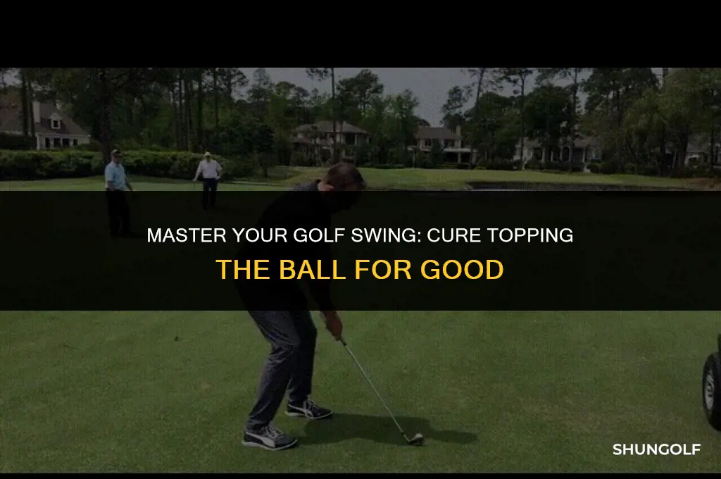how to fix golf swing topping the ball