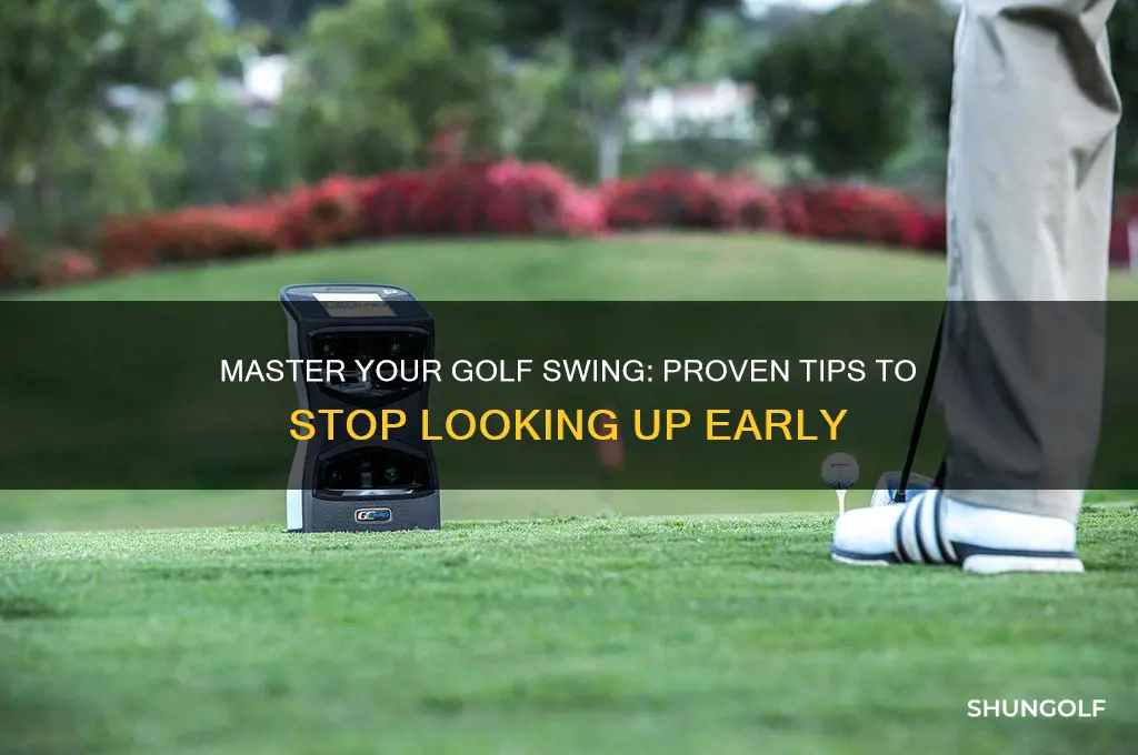 how to stop looking up in golf