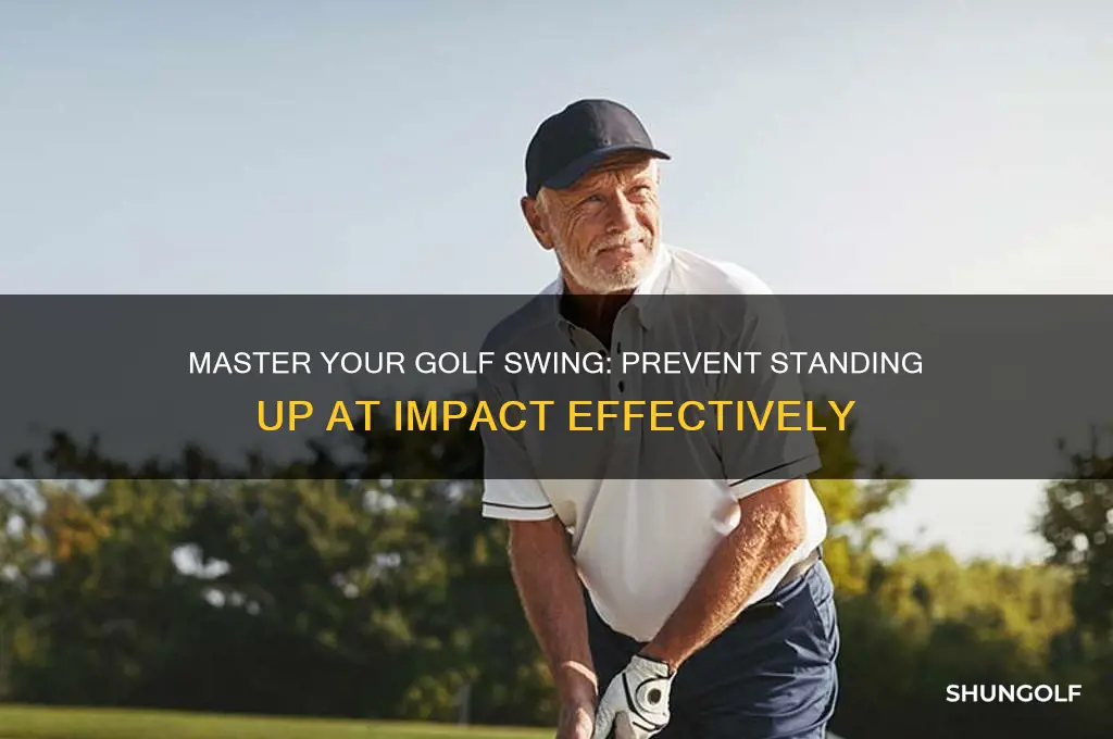 how to stop standing up at impact golf