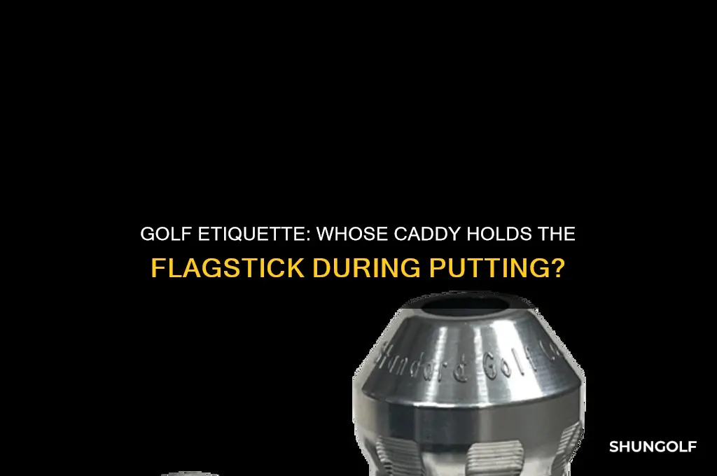when putting in golf whose caddy holds the flagstick